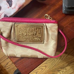 New coach wristlet. Never been used.